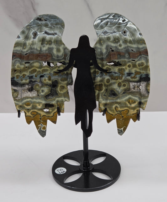Multi-colored and patterned Jasper angel wings on a black stand against a white background