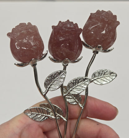 Strawberry Quartz crystal roses mounted on silver stems.