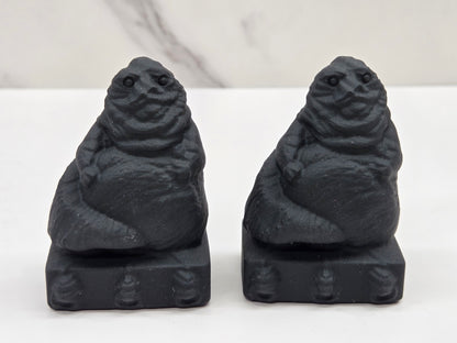 Obsidian Jabba the Hut, from Star Wars, carvings on a white background