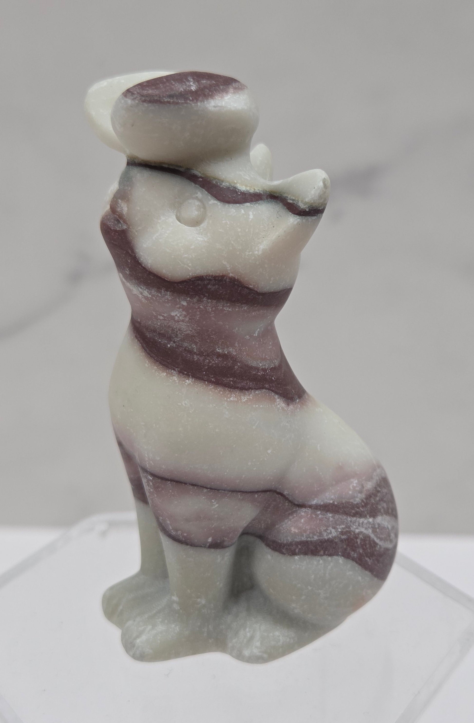 Banded Jasper crystal cat-shaped carving with a butterfly on the nose.