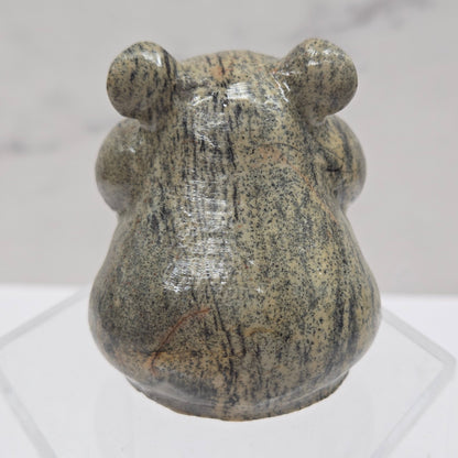 Picture Japser carving of a chipmunk on an acrylic block against a white background