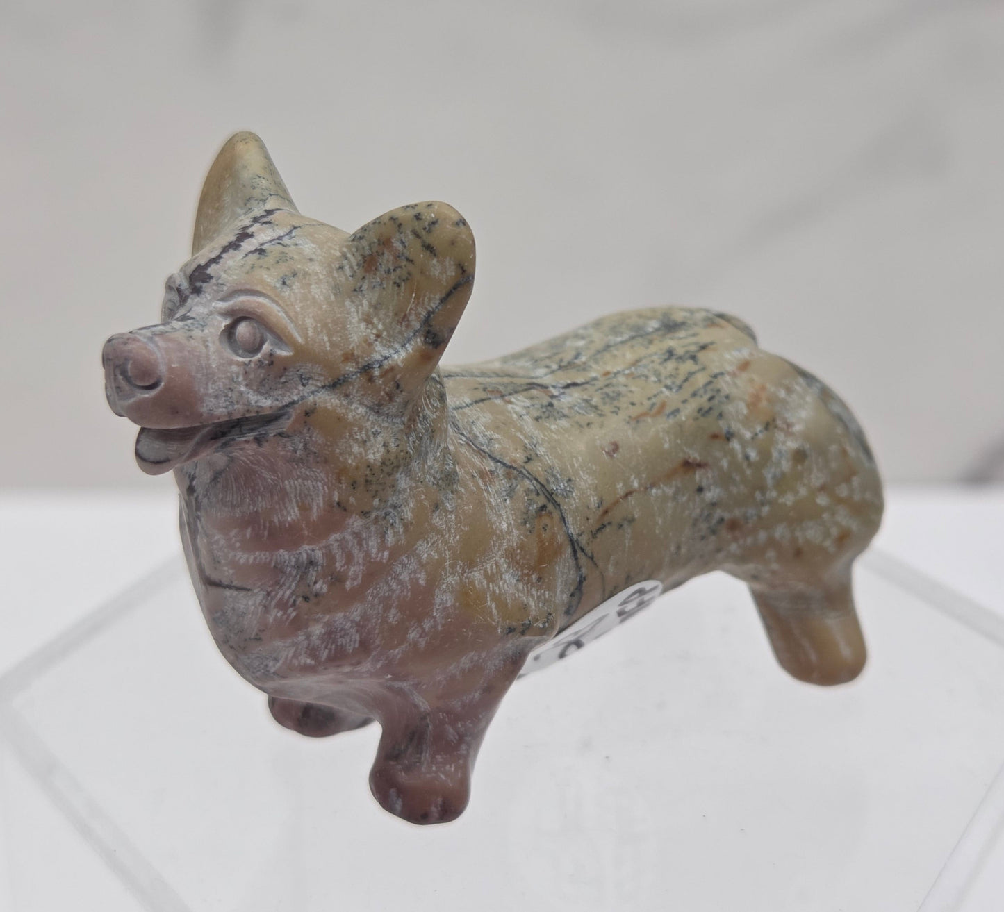 Decorative crystal Corgi dog carving on a white background