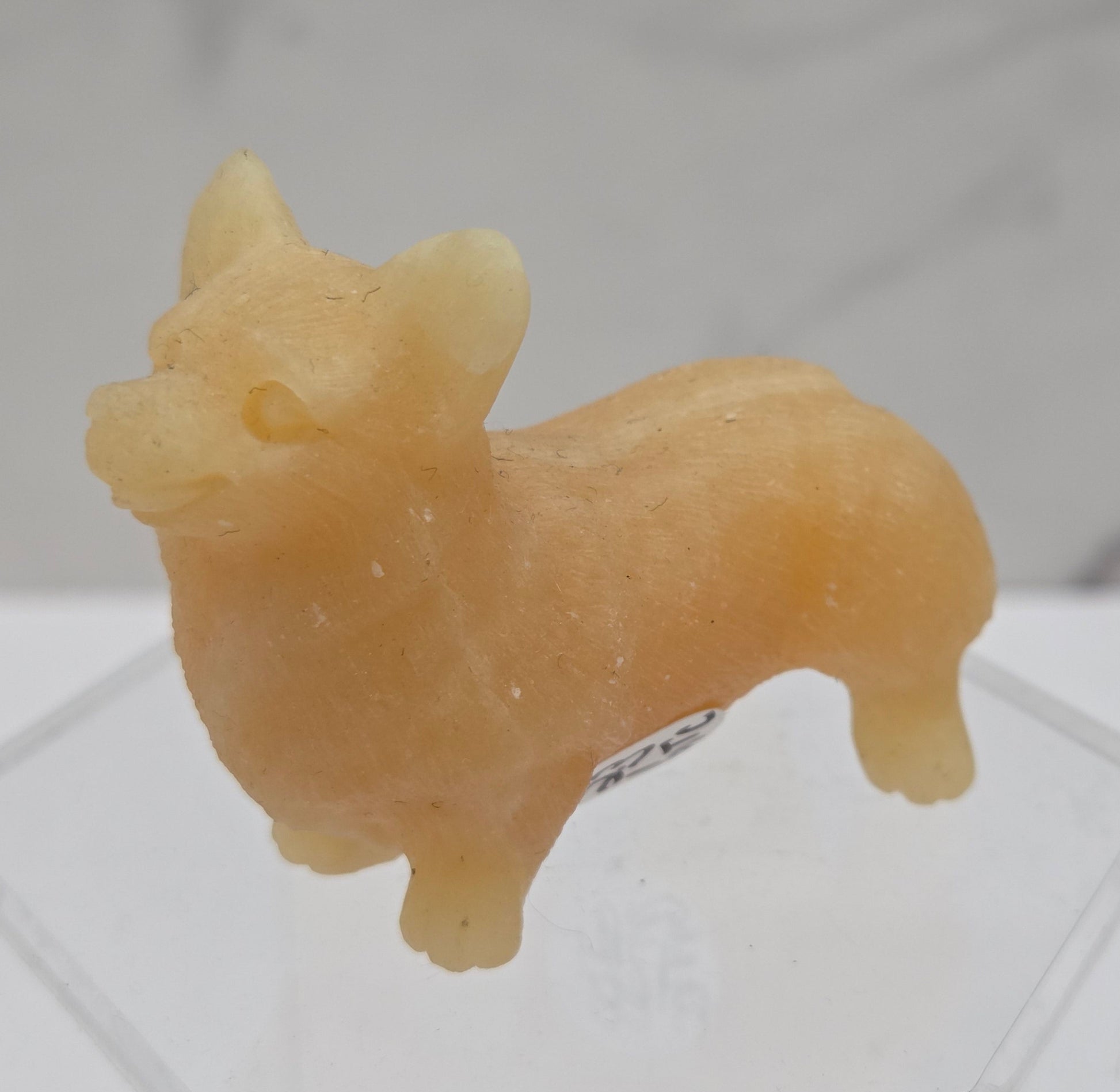 Decorative crystal Corgi dog carving on a white background