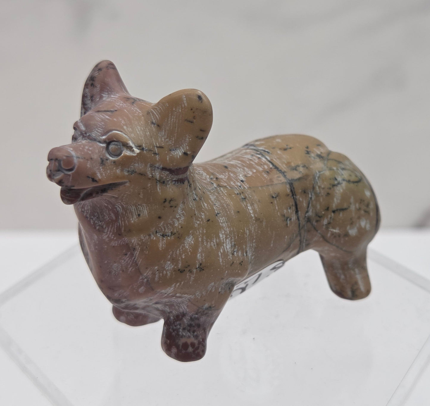 Decorative crystal Corgi dog carving on a white background