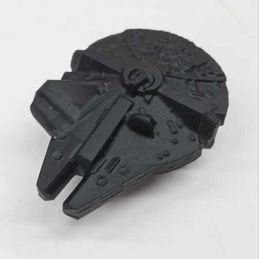 Black obsidian of a millennium spaceship on a white background