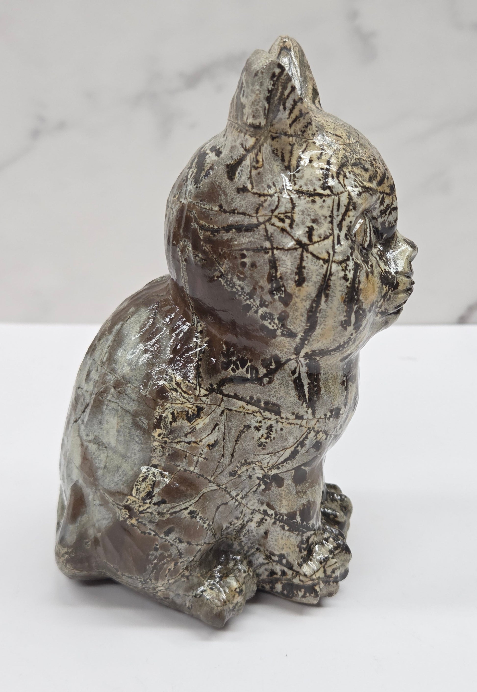 Decorative Picture Jasper cat carving on a white background