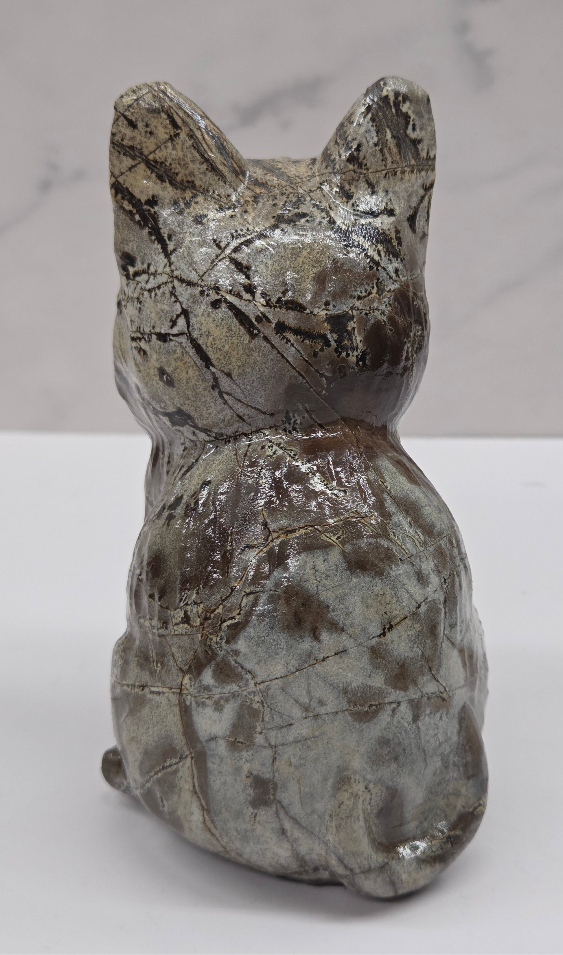 Decorative Picture Jasper cat carving on a white background