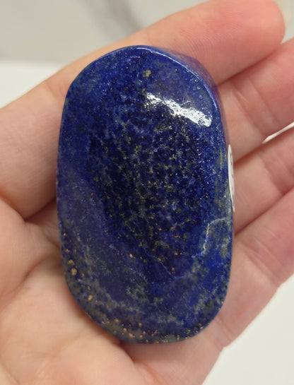 Lapis Lazuli polished palm with white, grey and blue coloring