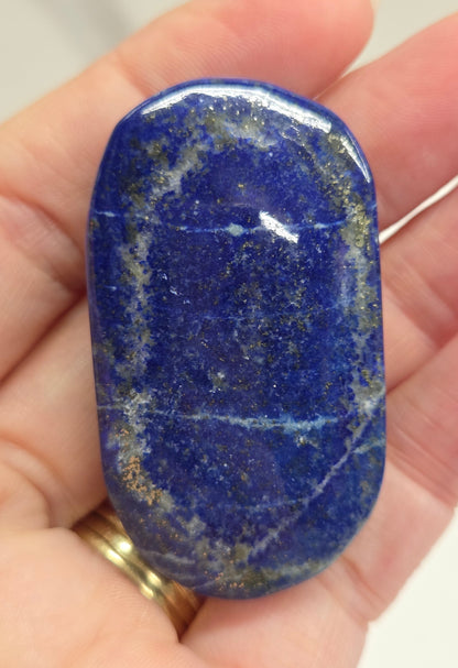 Lapis Lazuli polished palm with white, grey and blue coloring