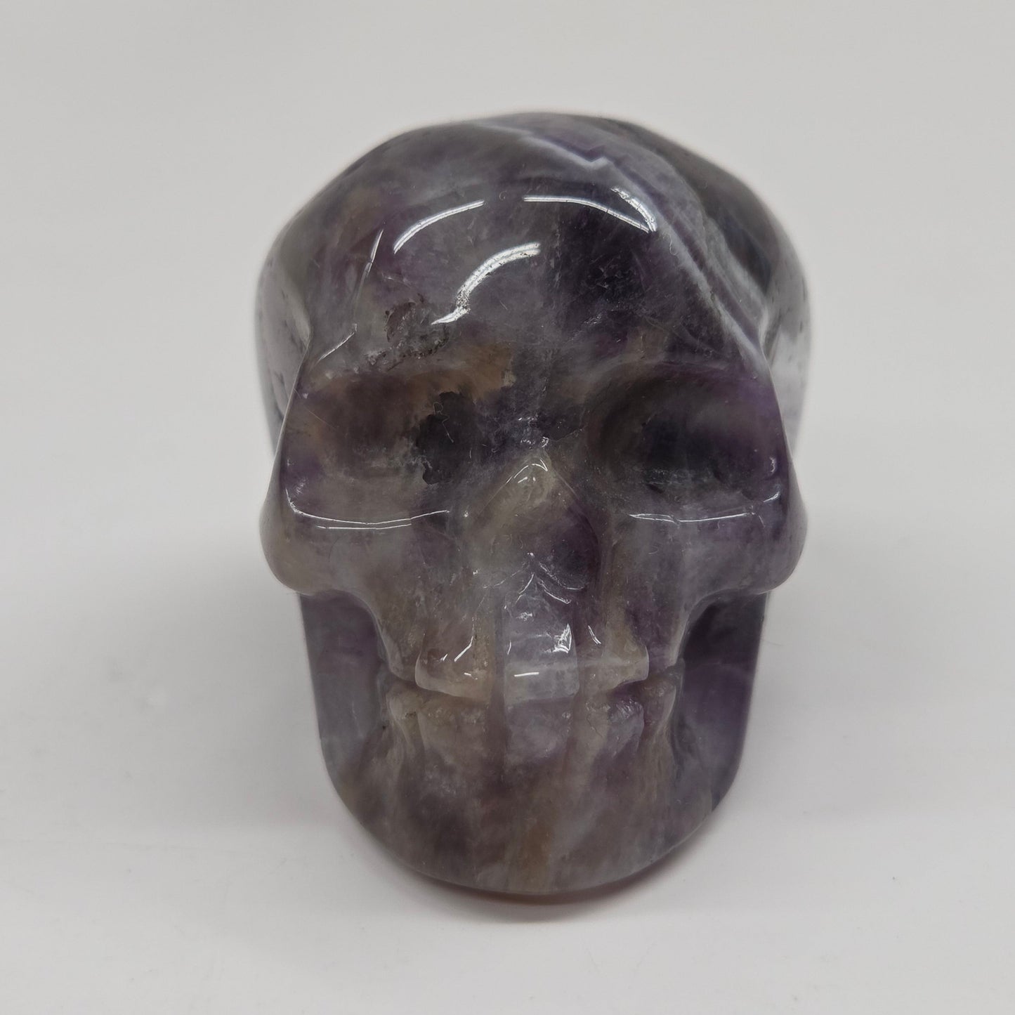 amethyst skull on a white background
