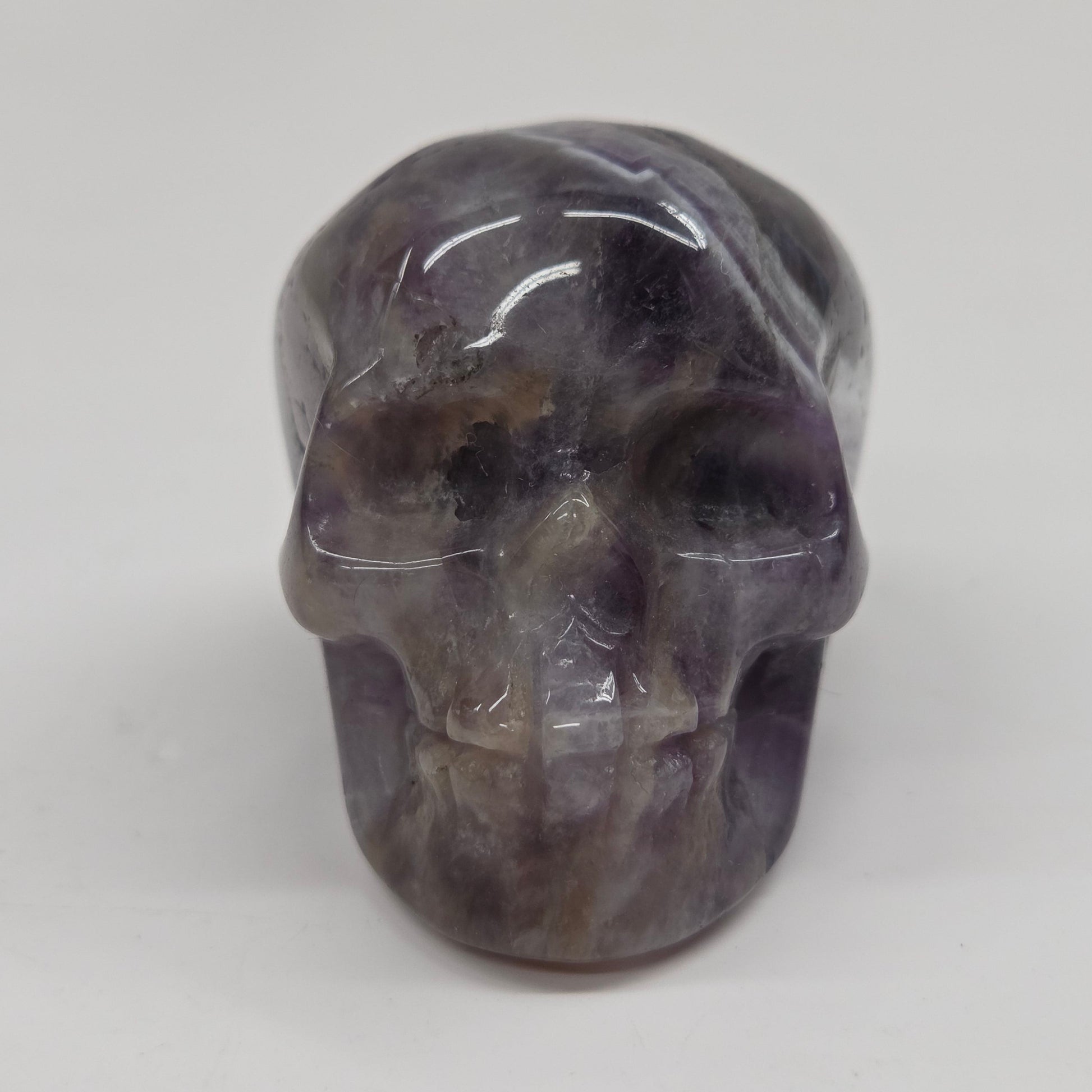 amethyst skull on a white background