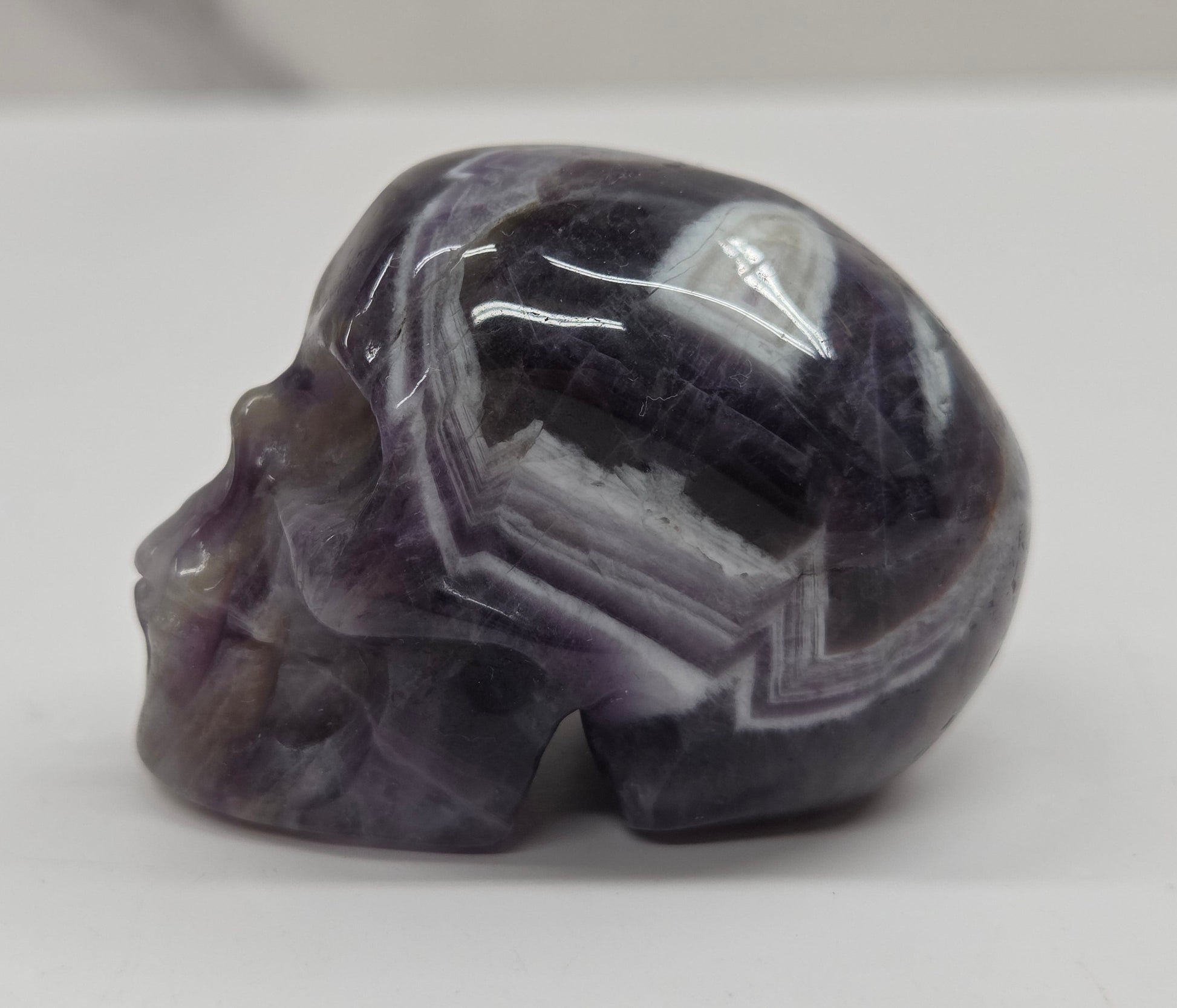 amethyst skull on a white background