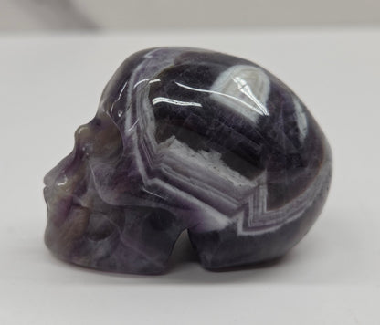 amethyst skull on a white background