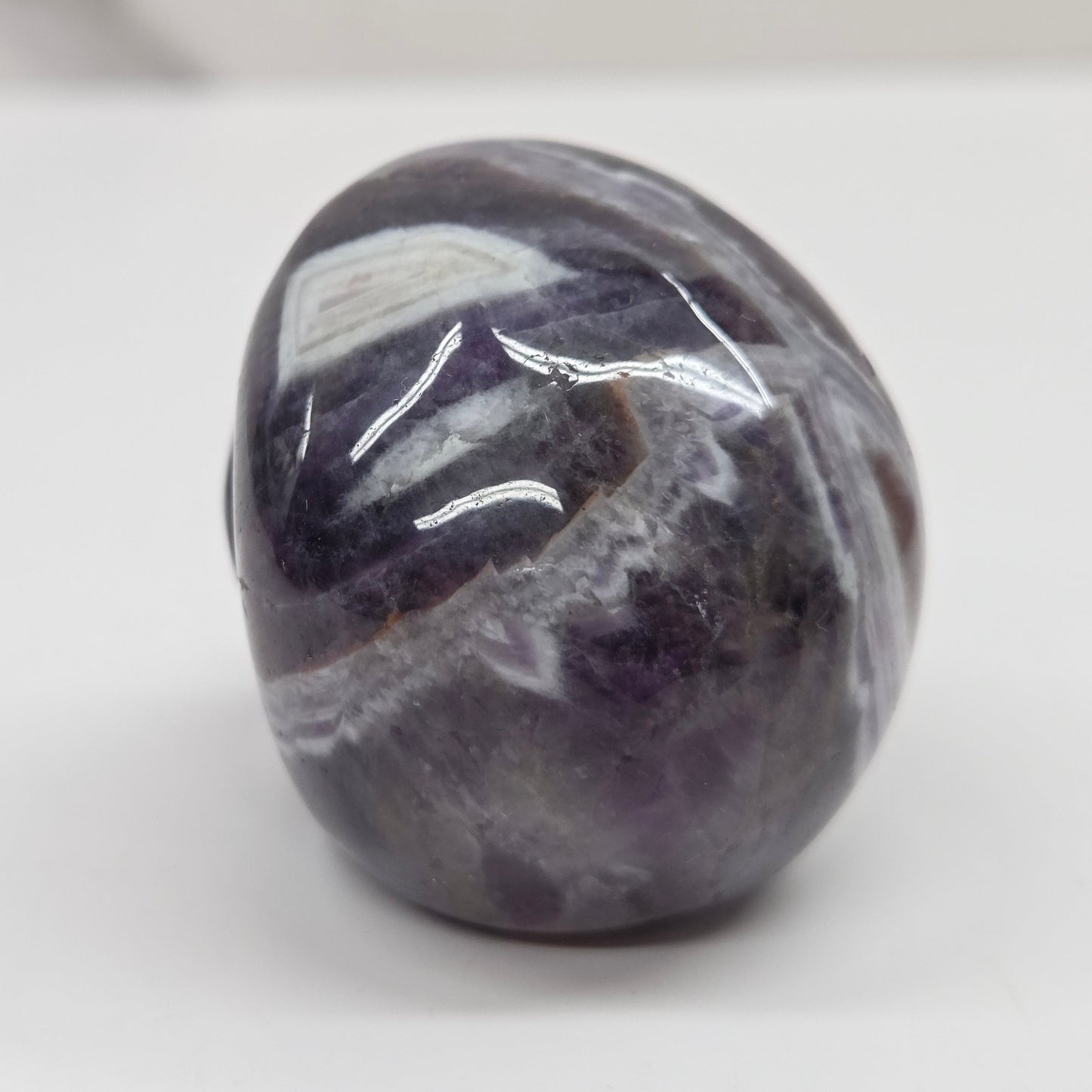 amethyst skull on a white background