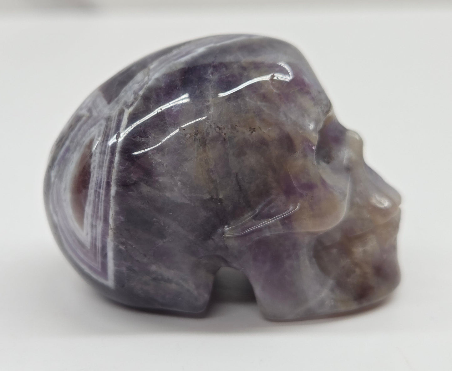 amethyst skull on a white background