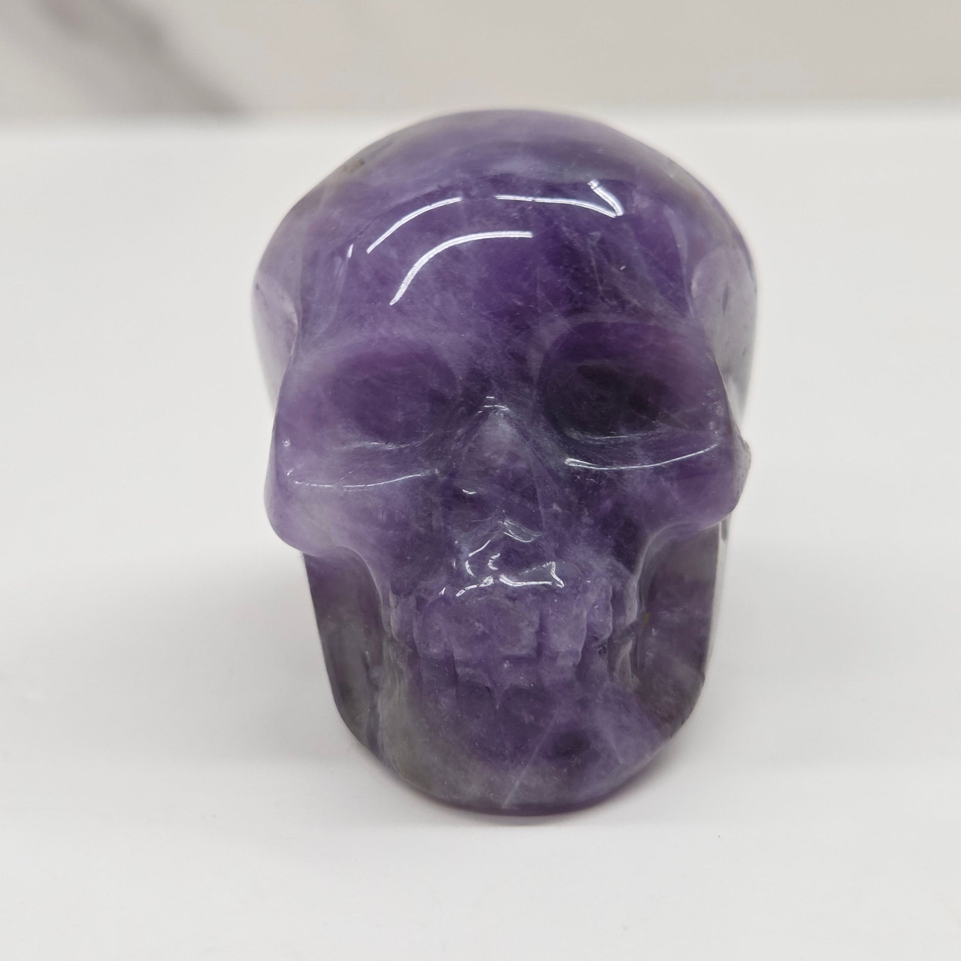 amethyst skull on a white background