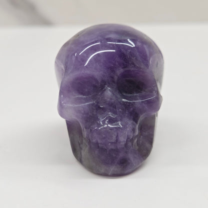 amethyst skull on a white background
