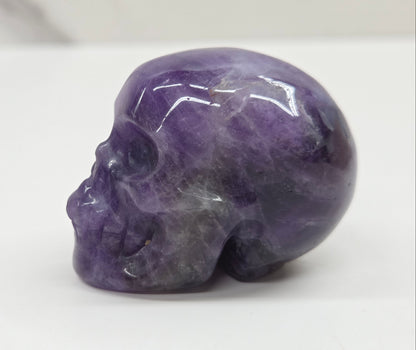 amethyst skull on a white background