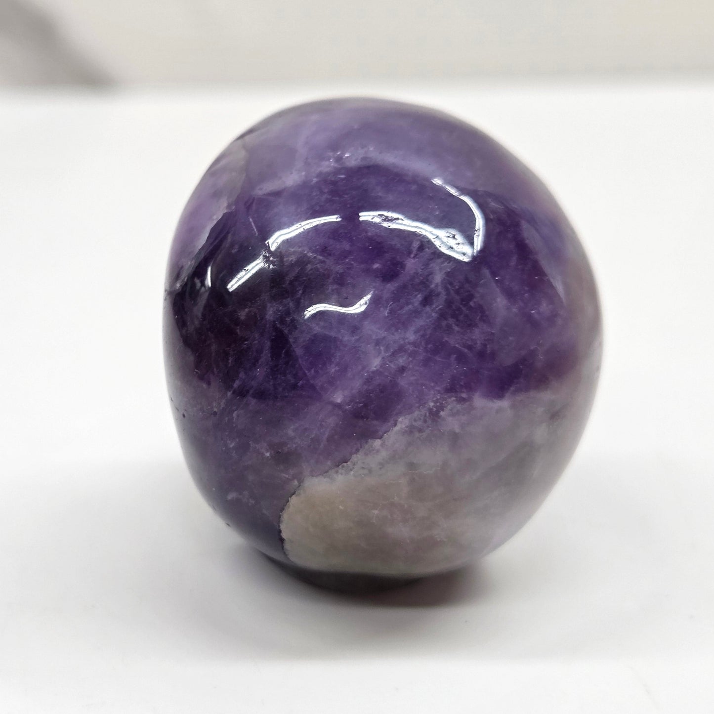 amethyst skull on a white background