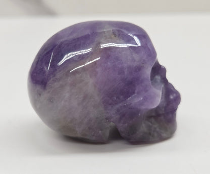 amethyst skull on a white background