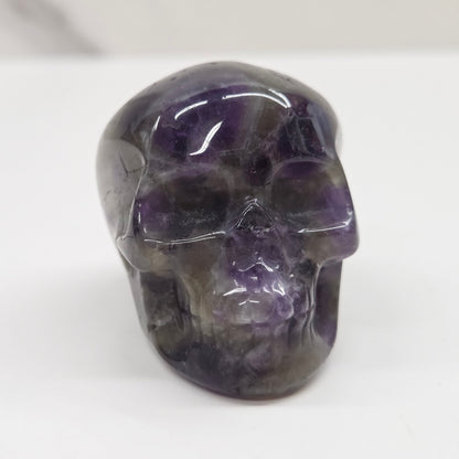amethyst skull on a white background