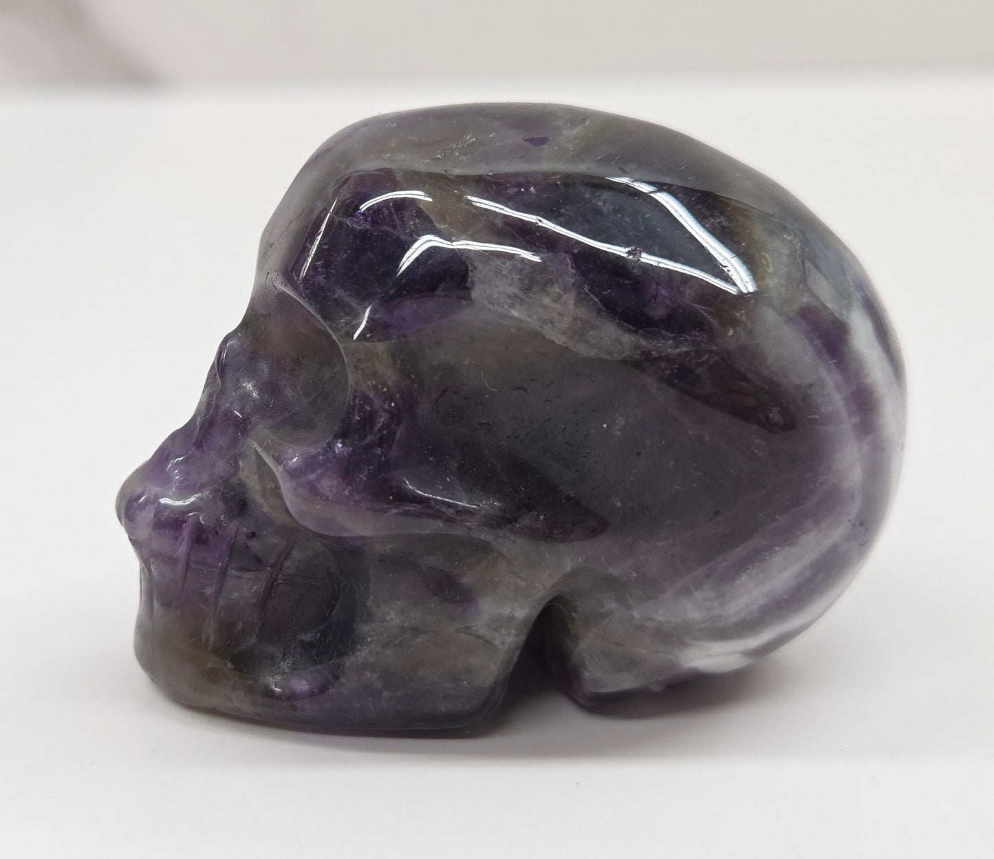 amethyst skull on a white background
