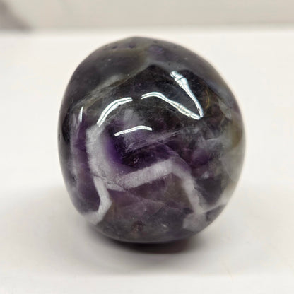 amethyst skull on a white background