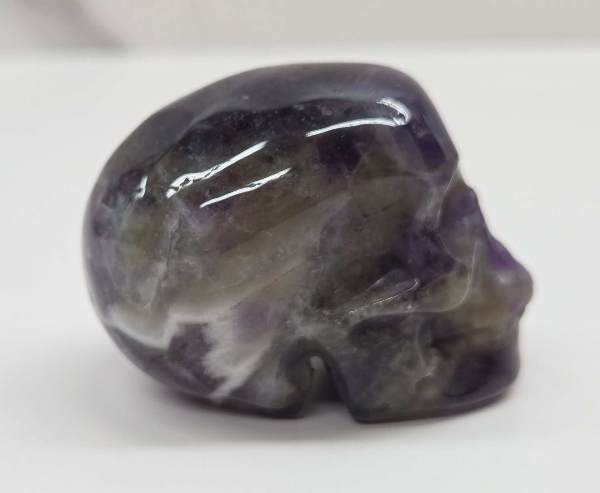 amethyst skull on a white background