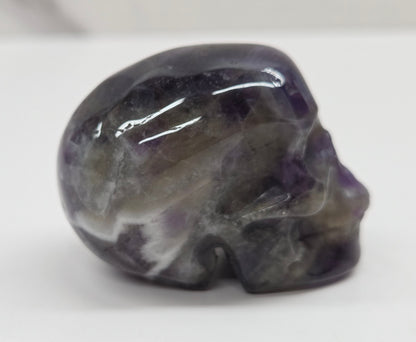 amethyst skull on a white background