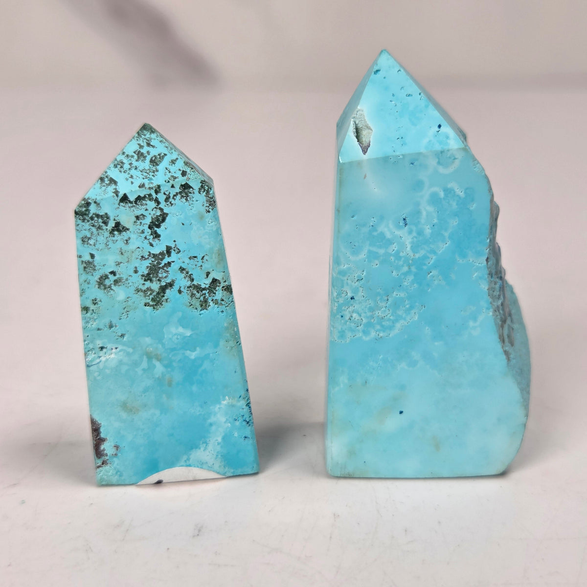 Light blue crystal points on a grey background