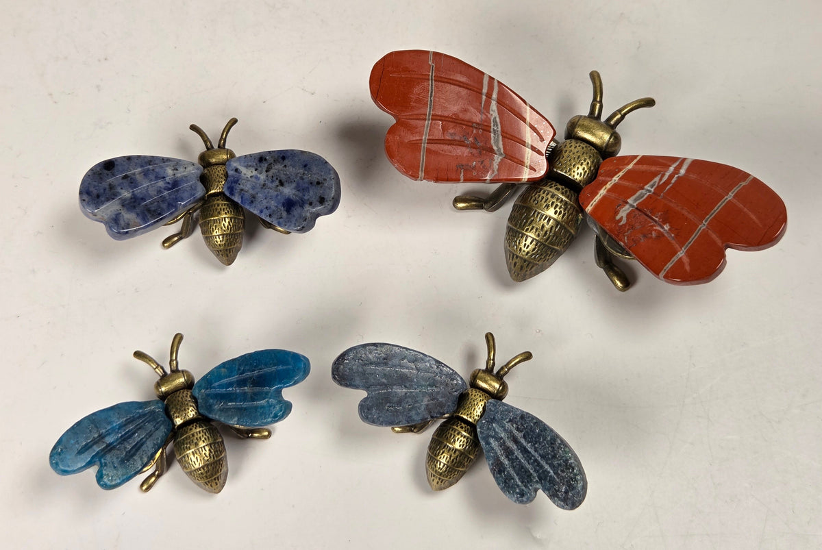 Collection of vintage-style brass bumblebee brooch. The brooch features detailed wing and body textures with a warm gold and bronze metallic finish.