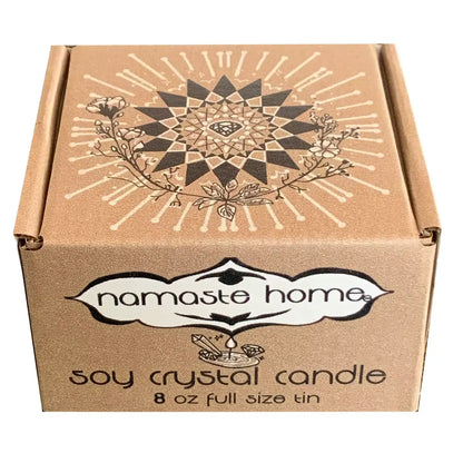 A square kraft cardboard candle box with a printed mandala design on the lid and the brand name 'namaste home' on the front, labeled as a soy crystal candle in an 8 oz full size tin.