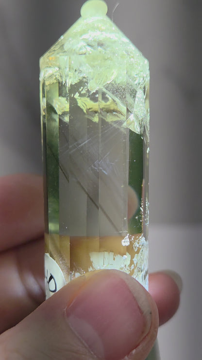 video of crystal point with blue inclusions