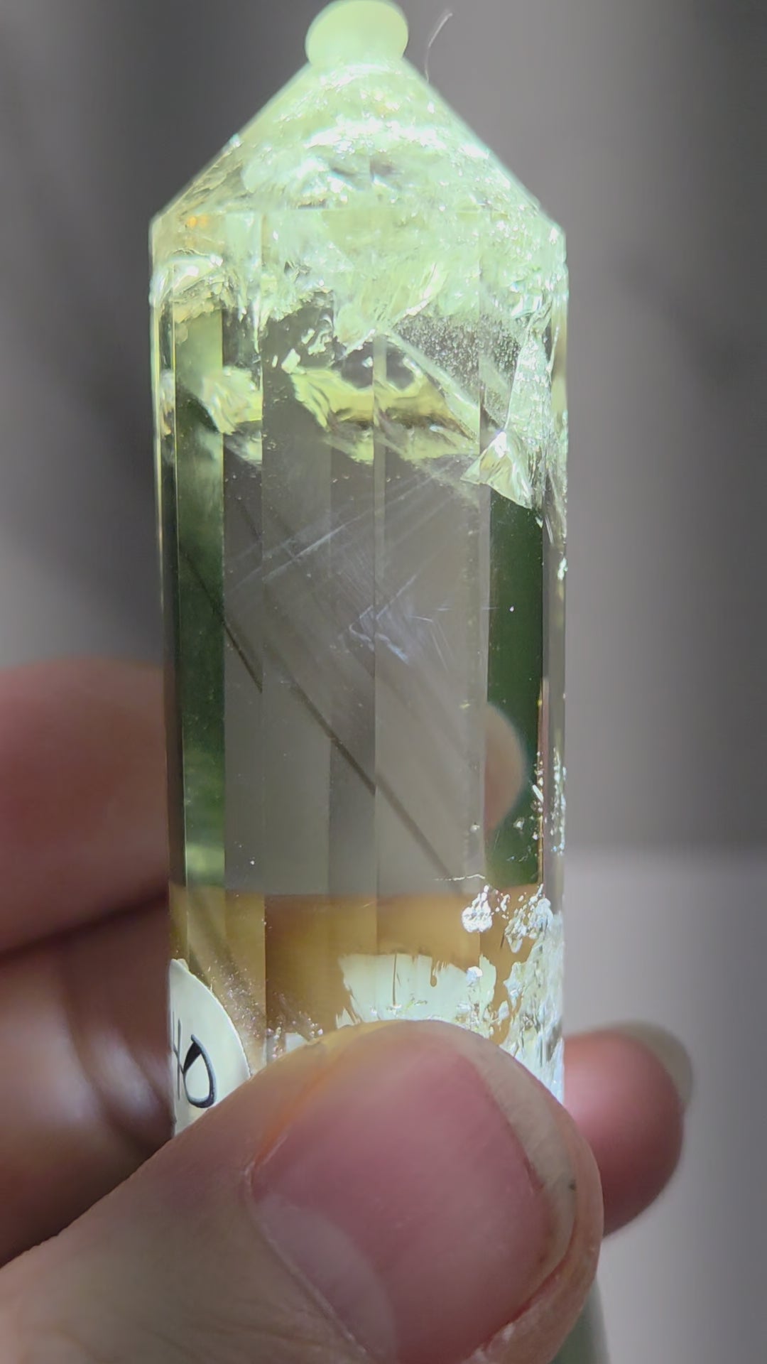 video of crystal point with blue inclusions