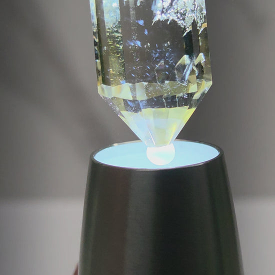 video of crystal point with blue inclusions