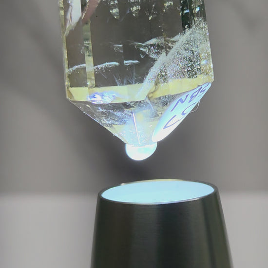 video of crystal point with blue inclusions
