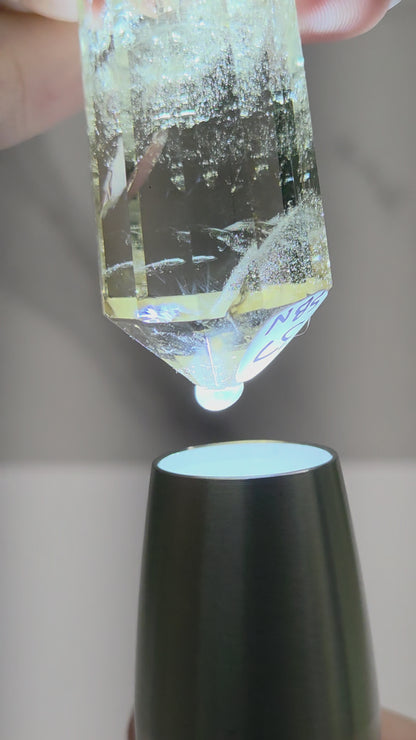 video of crystal point with blue inclusions
